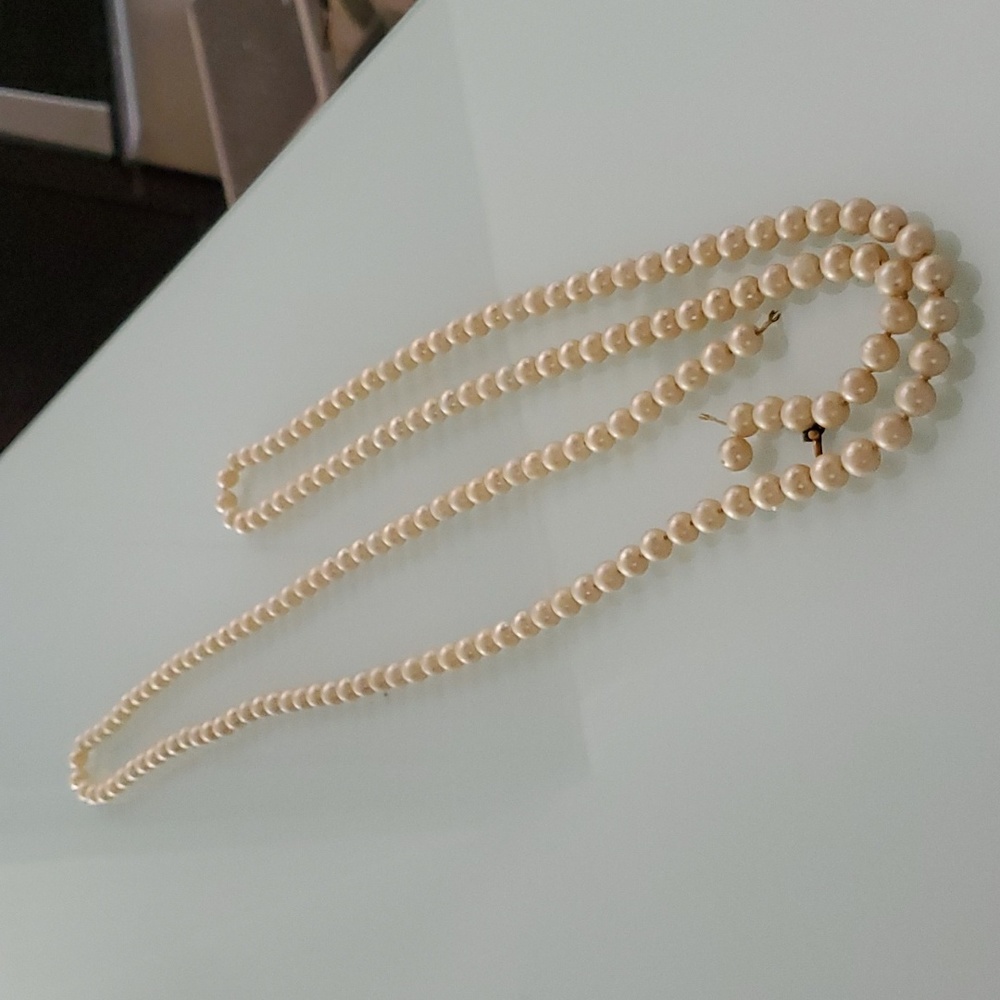 58 "pearl necklace knotted